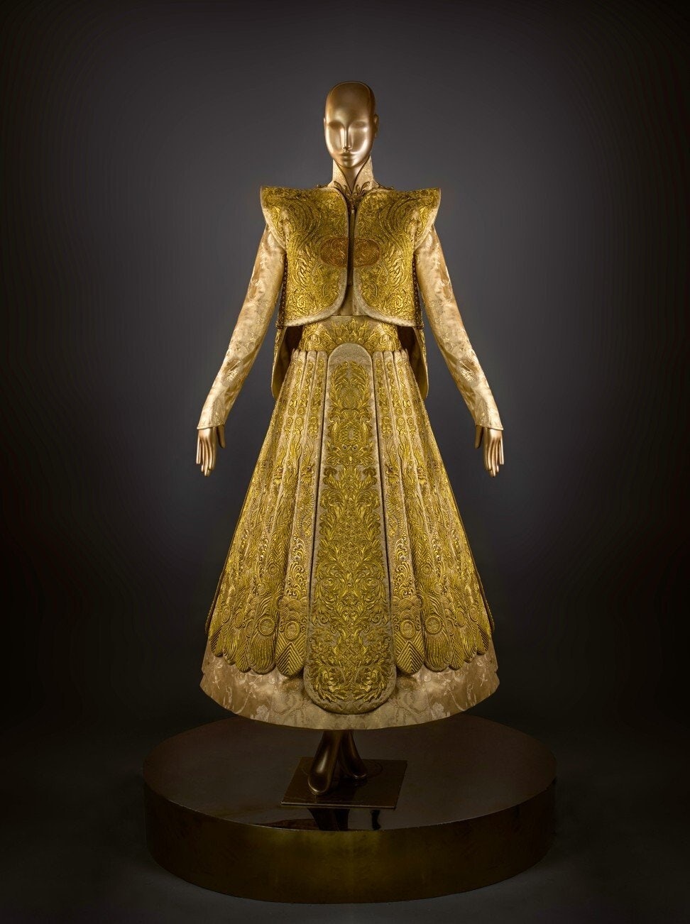 Guo Pei’s traditional bridal dress took five years to make using pure gold embroidery thread. Photo: Guo Pei