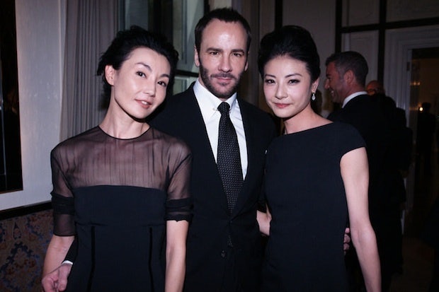 Tom Ford with Maggie Cheung and Tan Yuan Yuan at MAISON BOULUD in Beijing on May 18th, 2011 celebrating the launch of TOM FORD Womenswear in China.