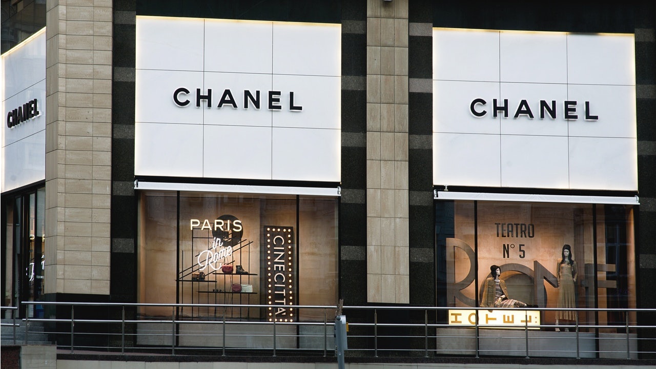 President of fashion at powerhouse Chanel, Bruno Pavlovsky, stands with DJ Michel Gaubert following his apology over racist actions. Photo: Shutterstock