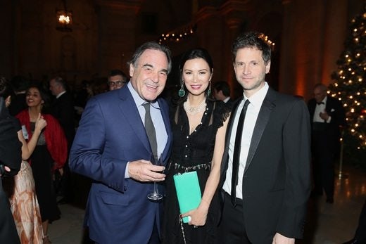 Wendi Deng Murdoch (C) with Oliver Stone (L) and Bennett Miller (R) at 