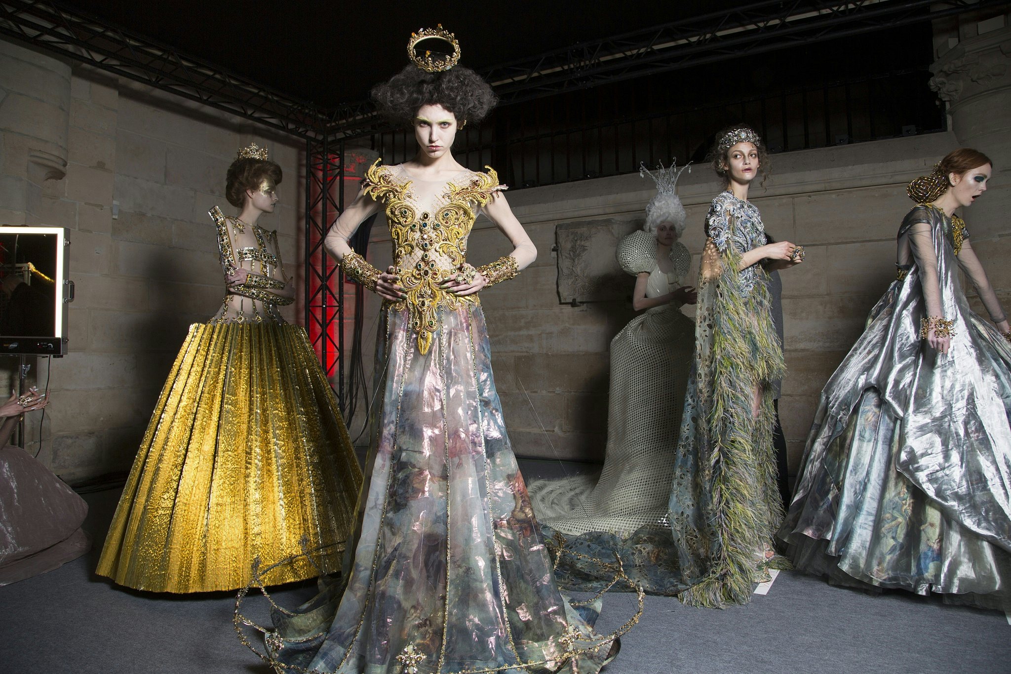 Models backstage during Guo Pei's spring summer 2017 Couture - Paris Fashion Week fashion show in Paris, First-look and lineup. (Image via VCG)