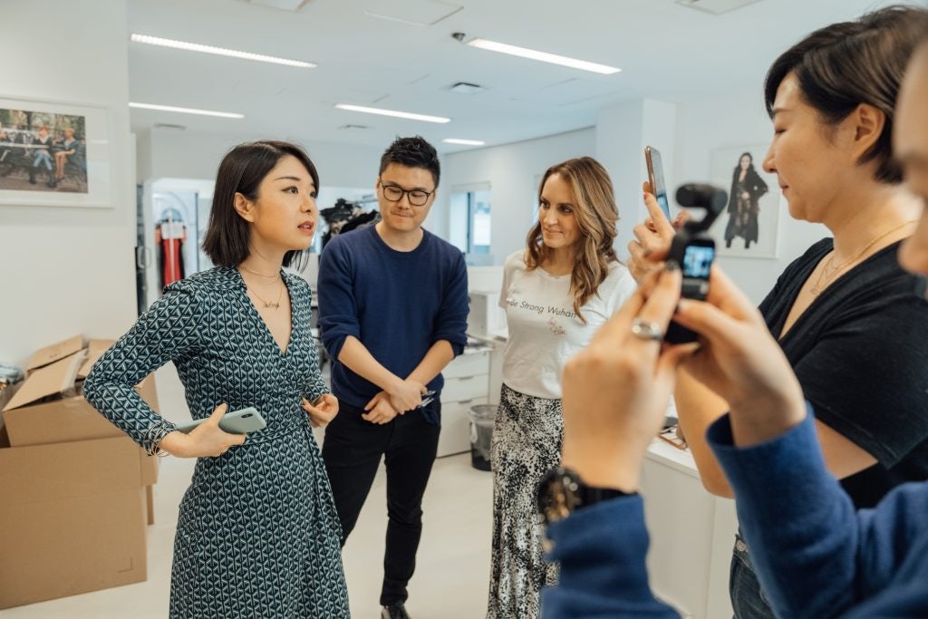 Hirata (first from left) in the livestreaming session on February 13 with a designer and Sandra Campos, the company’s CEO (third from left). Photo: Courtesy of DVF