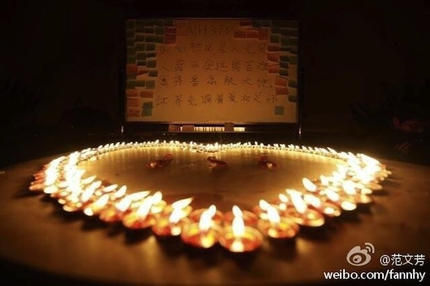 An image of a vigil set up for the passengers of MH370 posted by a Sina Weibo user.