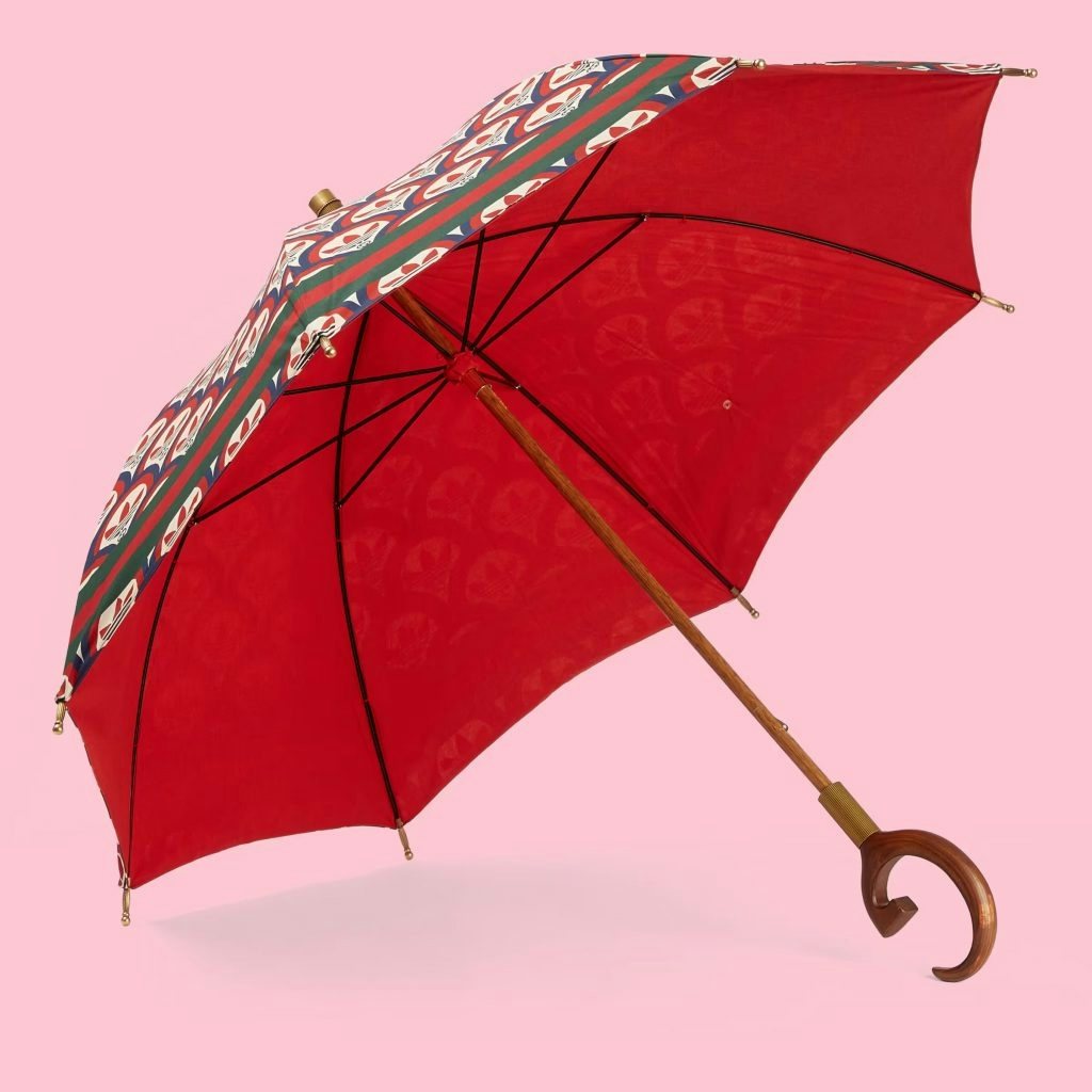 The Adidas x Gucci umbrella "is meant for sun protection or decorative use," according to Gucci's website. Photo: Gucci