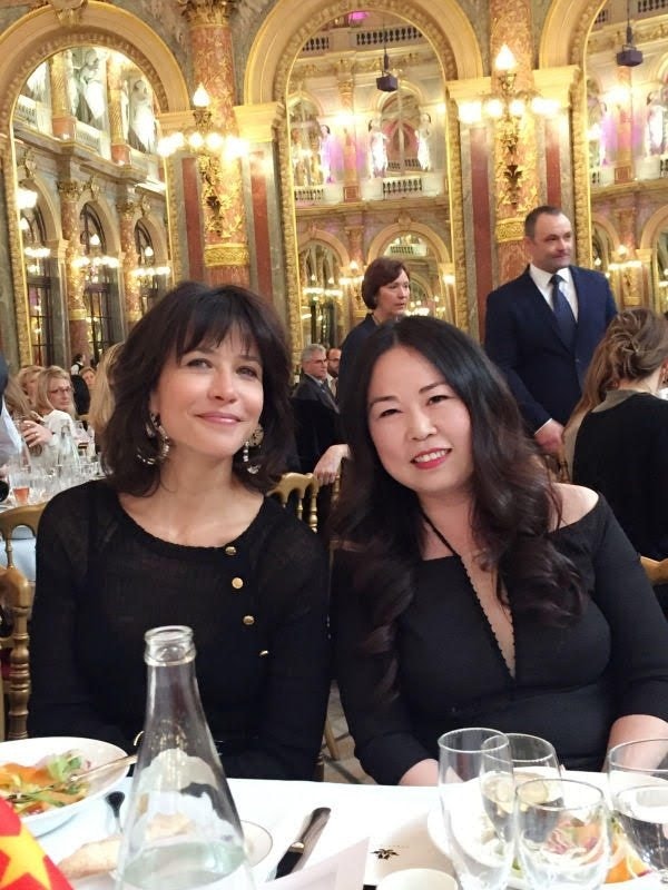 Grace Chen (R) with Sophie Marceau (L) at a lunch sponsored by the China Business Club in Paris. (Courtesy of Grace Chen)