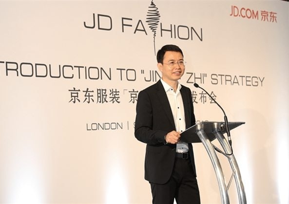 Lijun Xin, the president of JD.com’s apparel and home furnishing business unit, gives an address before JD.com's runway presentation during London Fashion Week. (Courtesy Photo)
