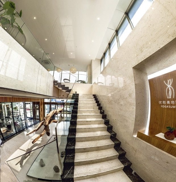 The revamped Grand Summit in Beijing recently introduced its brand new yoga studio, Yoga Summit. (Courtesy Photo)