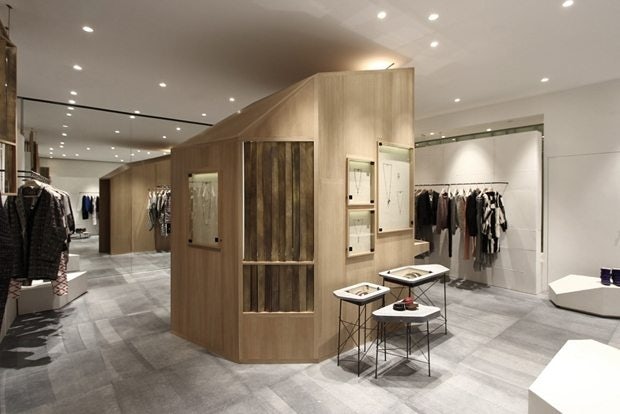A wooden cabin in the middle of an Isabel Marant store in Shanghai draws inspiration from "nail houses" that used to populate the area. (Ciguë)