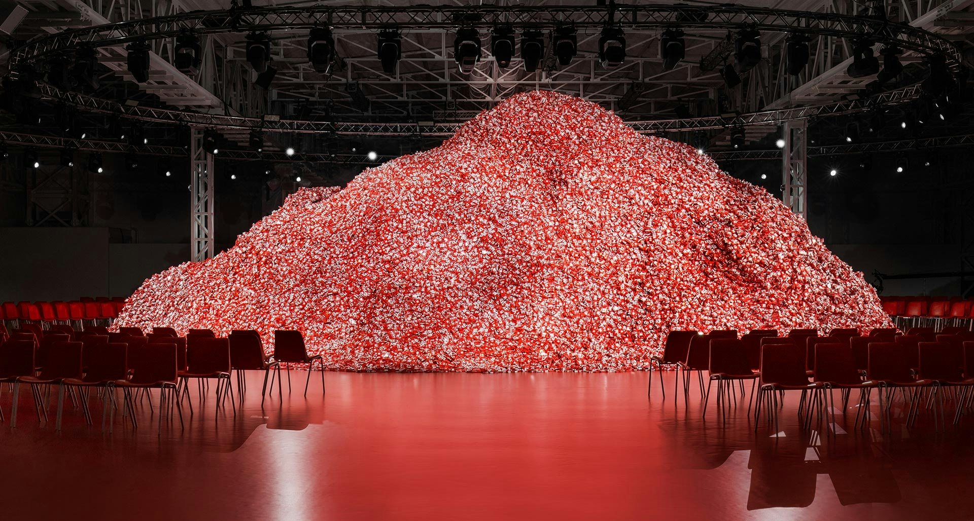 Diesel and Durex came together to create the world's largest heap of condoms. The backdrop of Diesel's Fall 2023 runway. Photo: Diesel