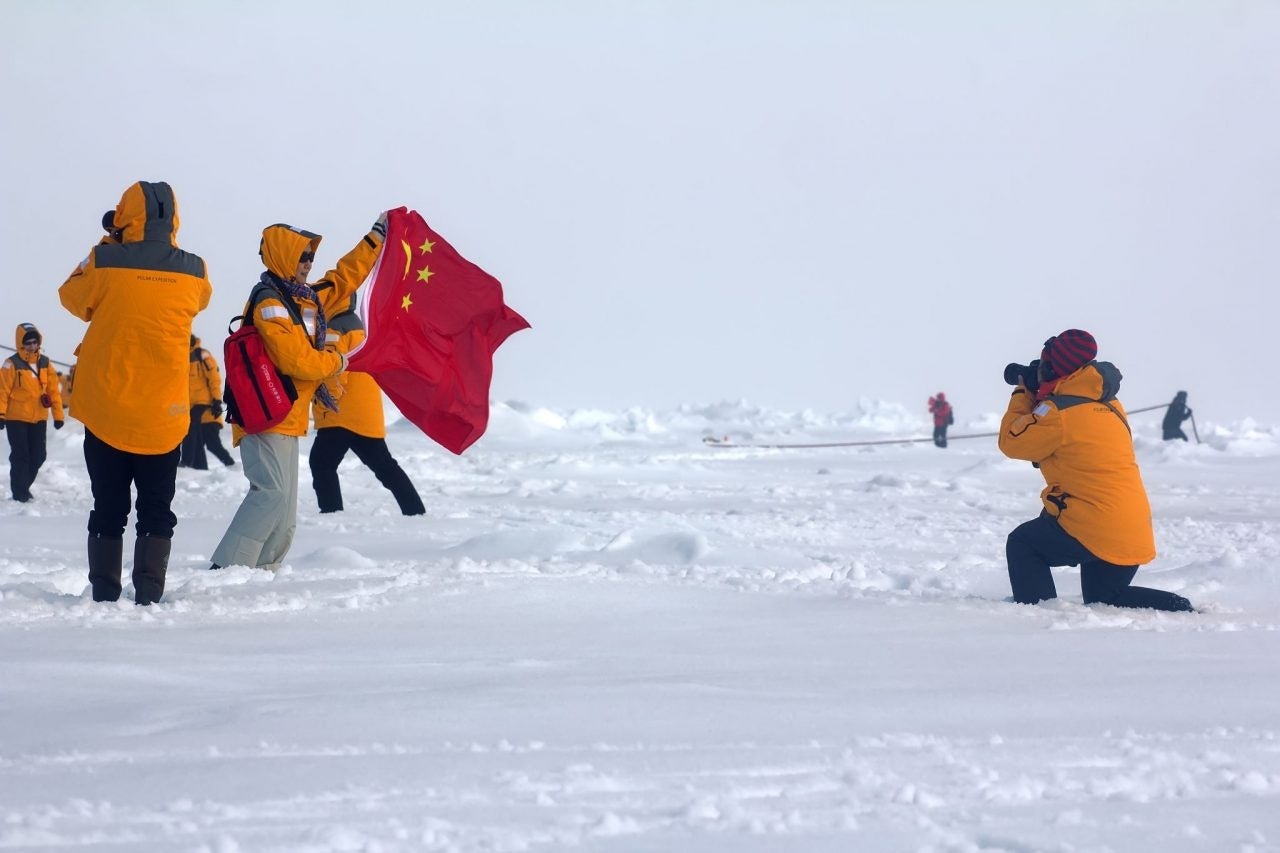 Chinese tourists at the North Pole. Photo: Maksimilian / Shutterstock.com