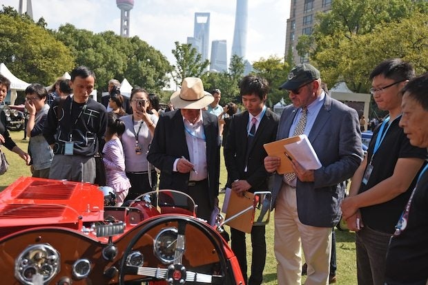 Judges inspect a car at the 2015 Bund Classic in Shanghai. (Courtesy Photo)