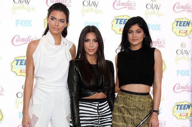 Kendall Jenner (L), Kim Kardashian (C), and Kylie Jenner (R) at the 2014 Teen Choice Awards at Shrine Auditorium on August 10, 2014 in Los Angeles, CA. (Shutterstock)