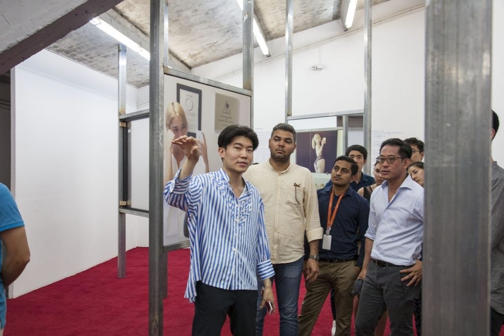 Michael Xufu Huang giving a tour of Heart of the Tin Man at M Woods. Photo: Courtesy of M Woods.