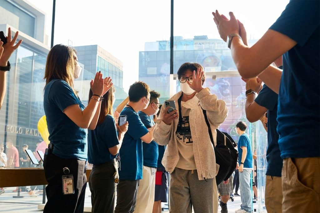 Apple's Beijing Sanlintun staff welcomed the first iPhone 14 customers in September. Photo: Apple
