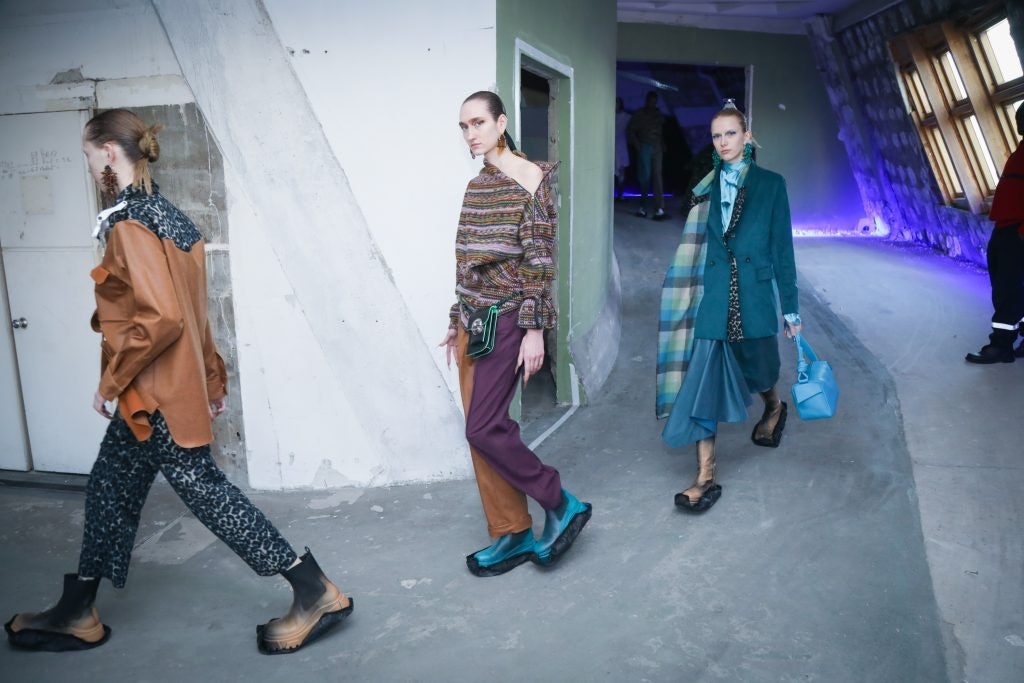 Models wearing From Another Planets Fall Winter 20 walk through the vast former Libération building on Rue Béranger during Paris Fashion Week. Photo: Courtesy of NowFashion