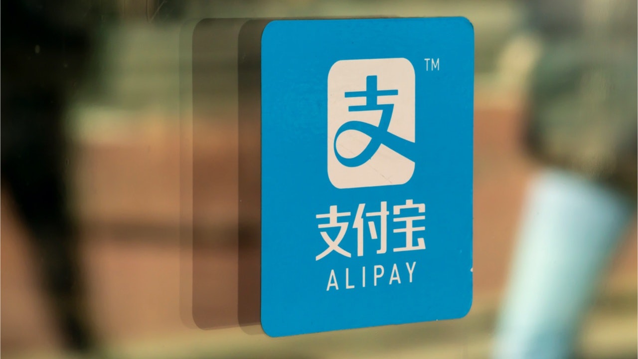 Meituan, a popular Chinese group buying website famous for delivering groceries, is battling Alibaba over payment platforms and other markets. Photo: Shutterstock