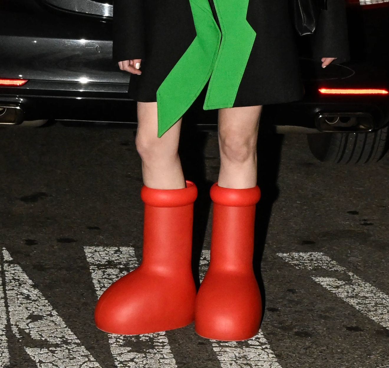 Gimmicks like MSCHF’s big red boots are designed to gain traction on social media. Photo: Fashionista