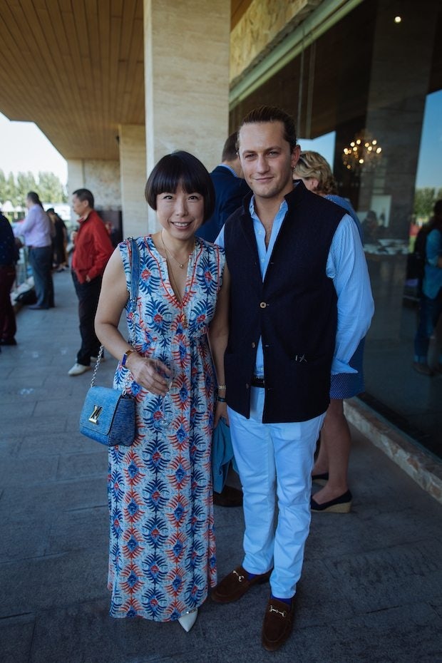 Vogue China Editor-in-Chief Angelica Cheung and Charlie Morris of Taylor Morris at British Polo Day in Beijing. (Sam Churchill/British Polo Day)