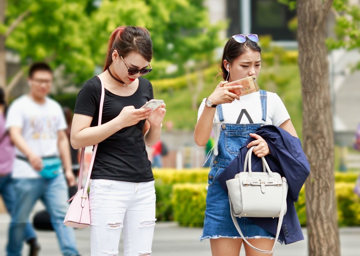Mobile usage plays a huge part in affluent consumer behavior in China. (Shutterstock)