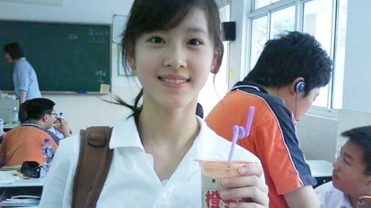 In 2009, a photo of a girl holding a cup of milk and wearing a bright smile went viral, creating another Chinese KOL. Photo courtesy: South China Morning Post