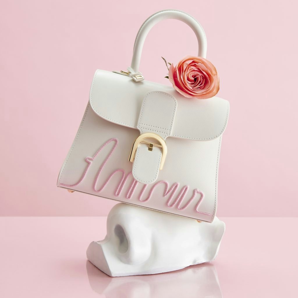 Delvaux's collaboration collection ranges from the intertwining swans and the inscription "Amour" on the L’Amour series, to the clever interpretations of Magritte’s bowler hat. Photo: Delvaux