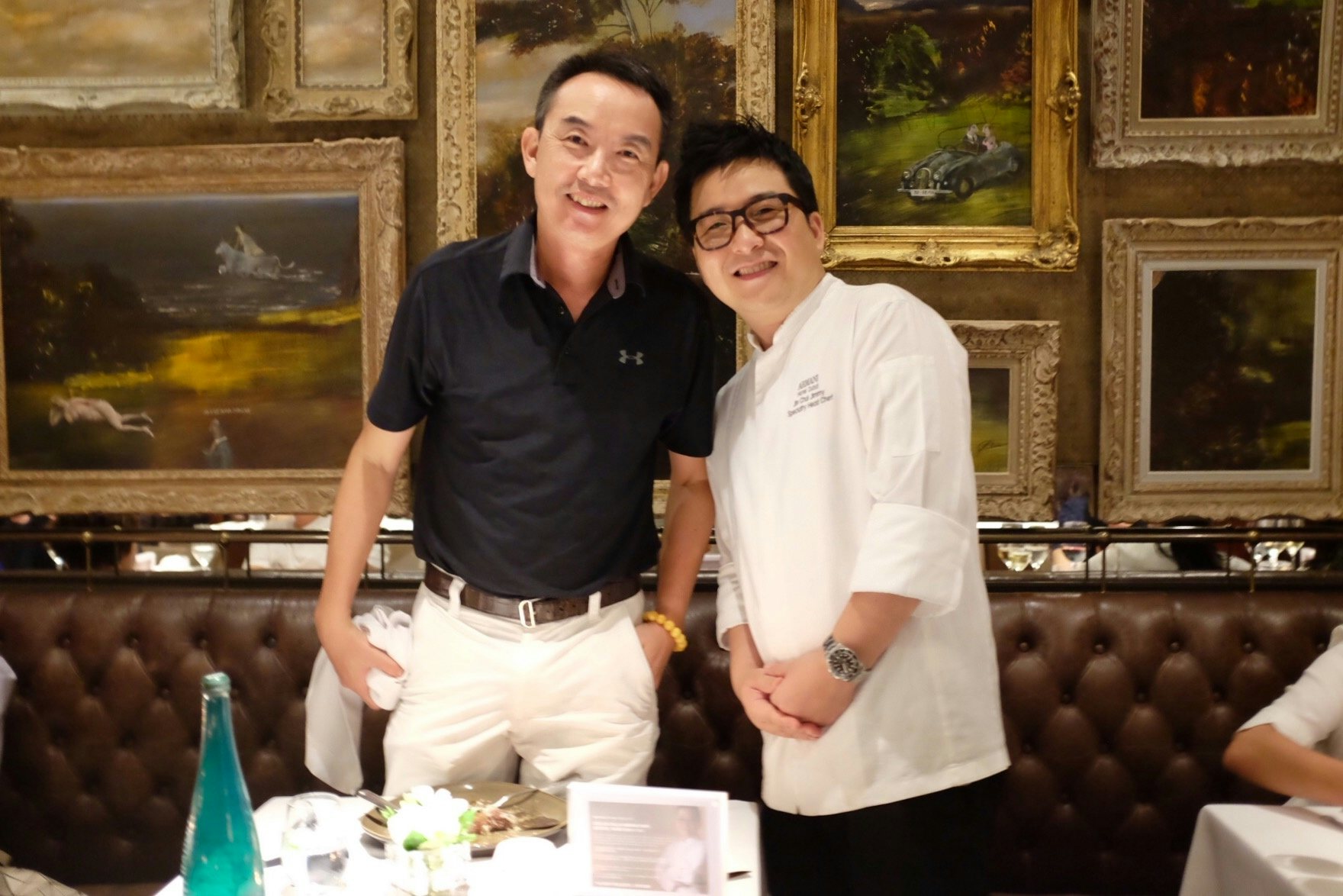 Chef Jin Chul Kim (right) with dinner guest at Kee Club dinner for the Armani Hotel Dubai. Courtesy of Armani Hotel Dubai