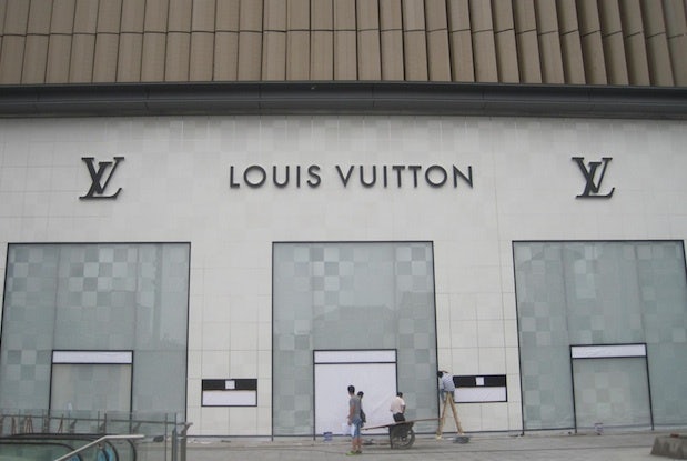 Workers put the finishing touches on Hefei's Louis Vuitton store