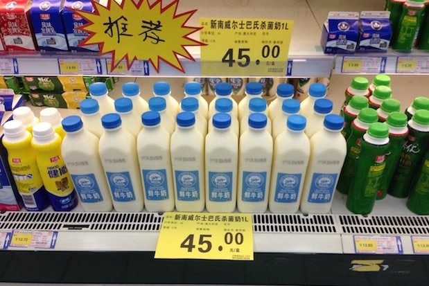 Imported milk is China's latest middle-class "luxury" item. (Business Insider Australia)