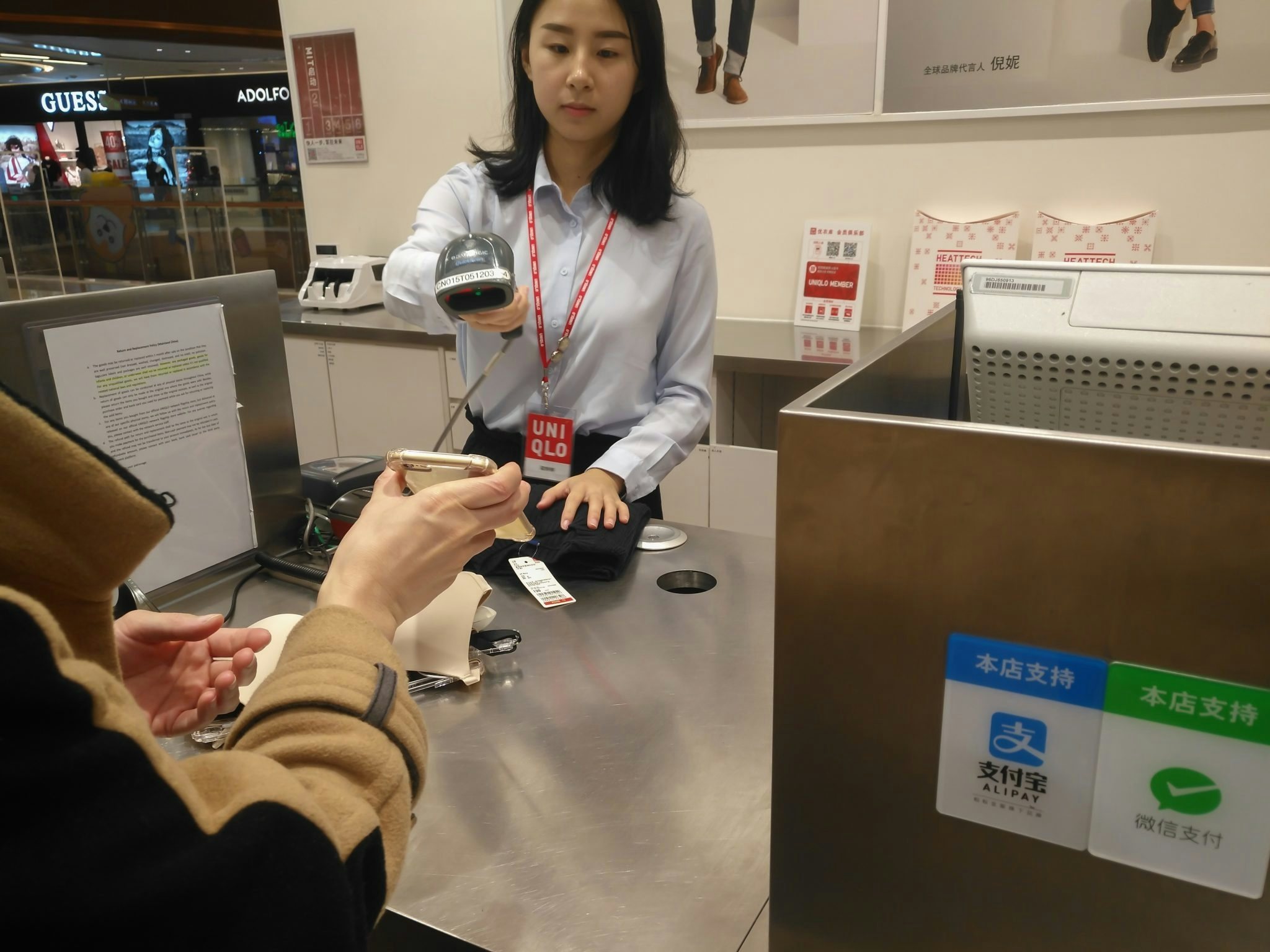 WeChat payment is widely accepted in Chinese retail stores. Photo: Shutterstock.com/Freer