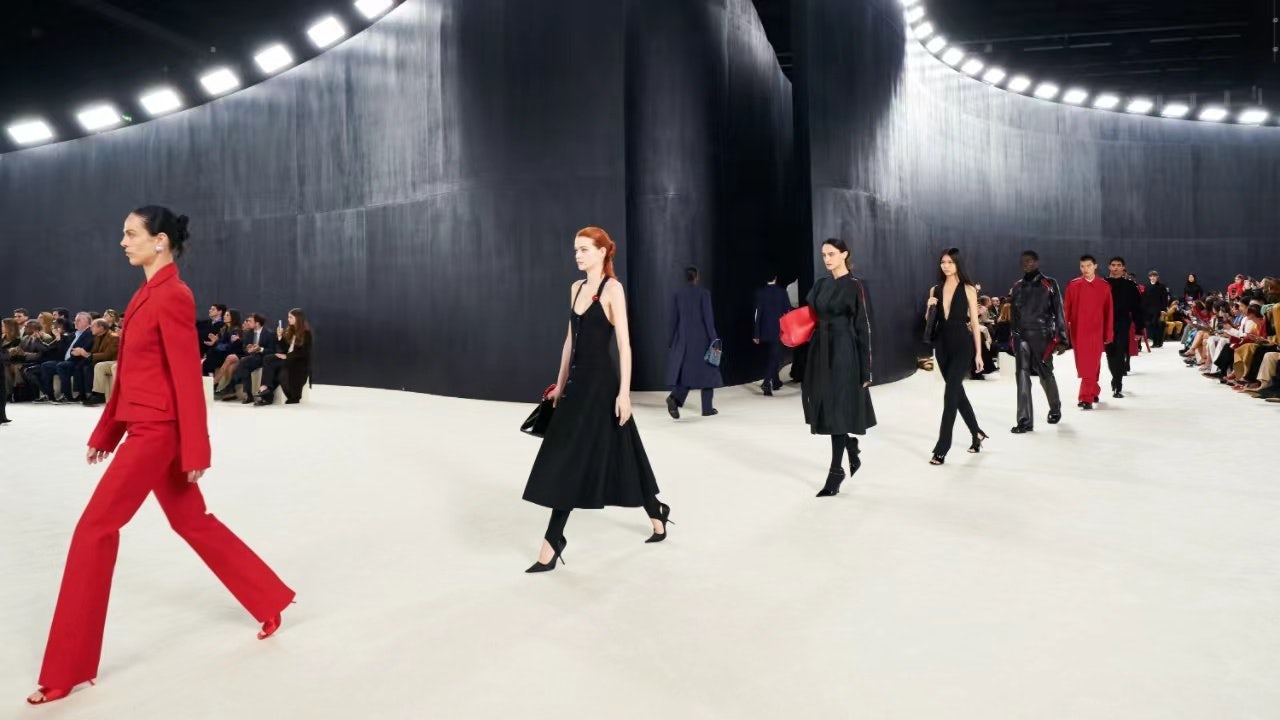 Davis elevates the Fall 2023 wardrobe with hints of black, gray, midnight blue, and optic-white with the house’s signature red hue. Photo: Ferragamo