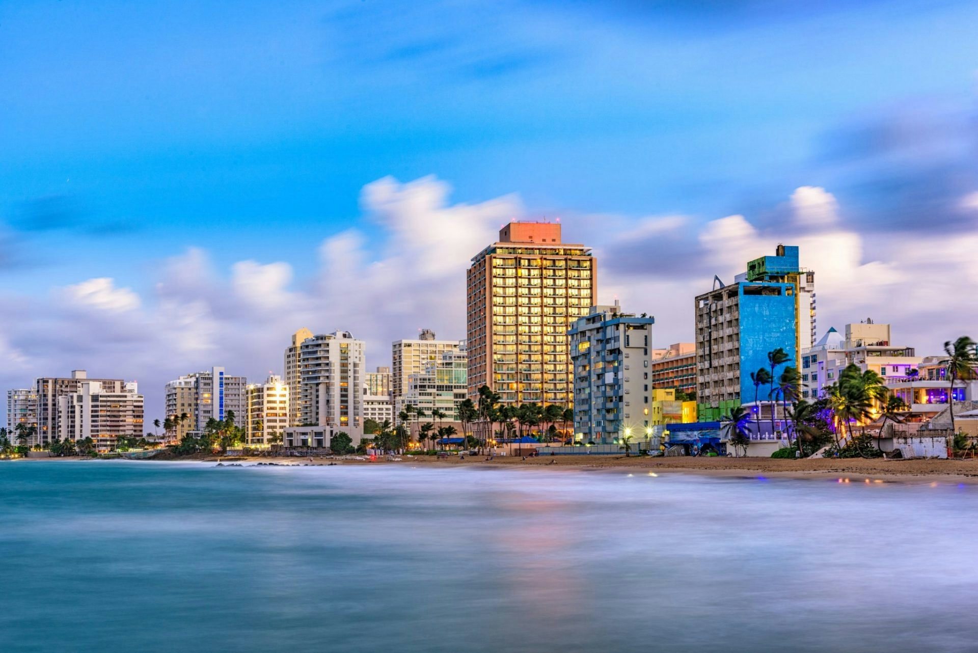 San Juan Skyline from Condado Beach. Puerto Rico hopes that a new China themed park will attract more Chinese visitors help ease its financial woes. Photo: Sean Pavone/Shutterstock